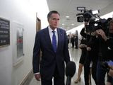 Sen. Mitt Romney, R-Utah, pauses to speak to media as he arrives for a briefing on Capitol Hill in Washington, Thursday, March, 12, 2020, on the coronavirus outbreak. (AP Photo/Carolyn Kaster)