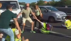 WATCH: Frustrated Drivers Take Matter into Own Hands After Protesters Sit in Middle of Busy Road