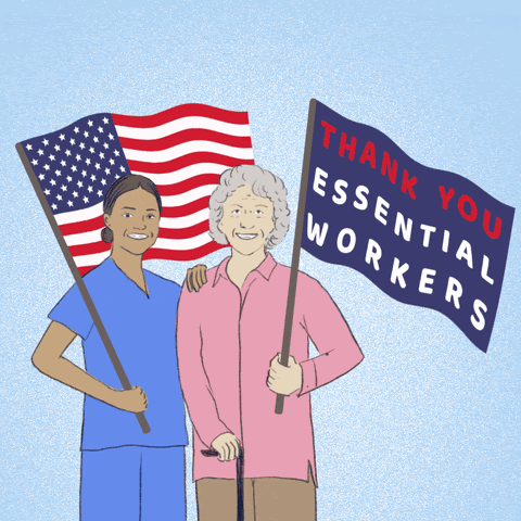 Image of two women standing together. One is holding an American flag and the other is holding a flag that states "Thank you essential workers"