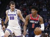 Washington Wizards forward Rui Hachimura, right, drives against Sacramento Kings forward Nemanja Bjelica during the first quarter of an NBA basketball game in Sacramento, Calif., Tuesday, March 3, 2020. (AP Photo/Rich Pedroncelli)